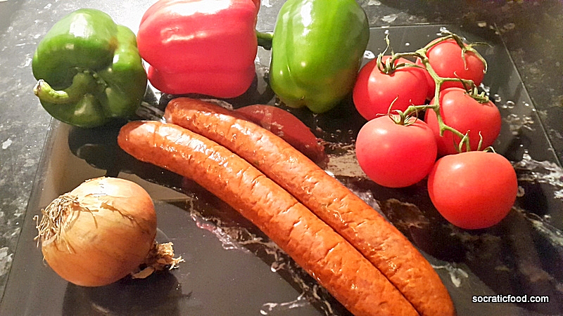 Sausages with peppers in tomato sauce (Spetsofai)